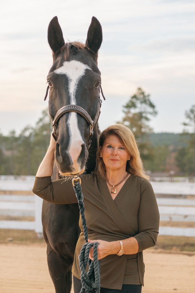 Shelby Stanfill, REALTOR, with her horse in Aiken, SC